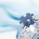 White Label Benefits concept: puzzle piece being put into place on the world